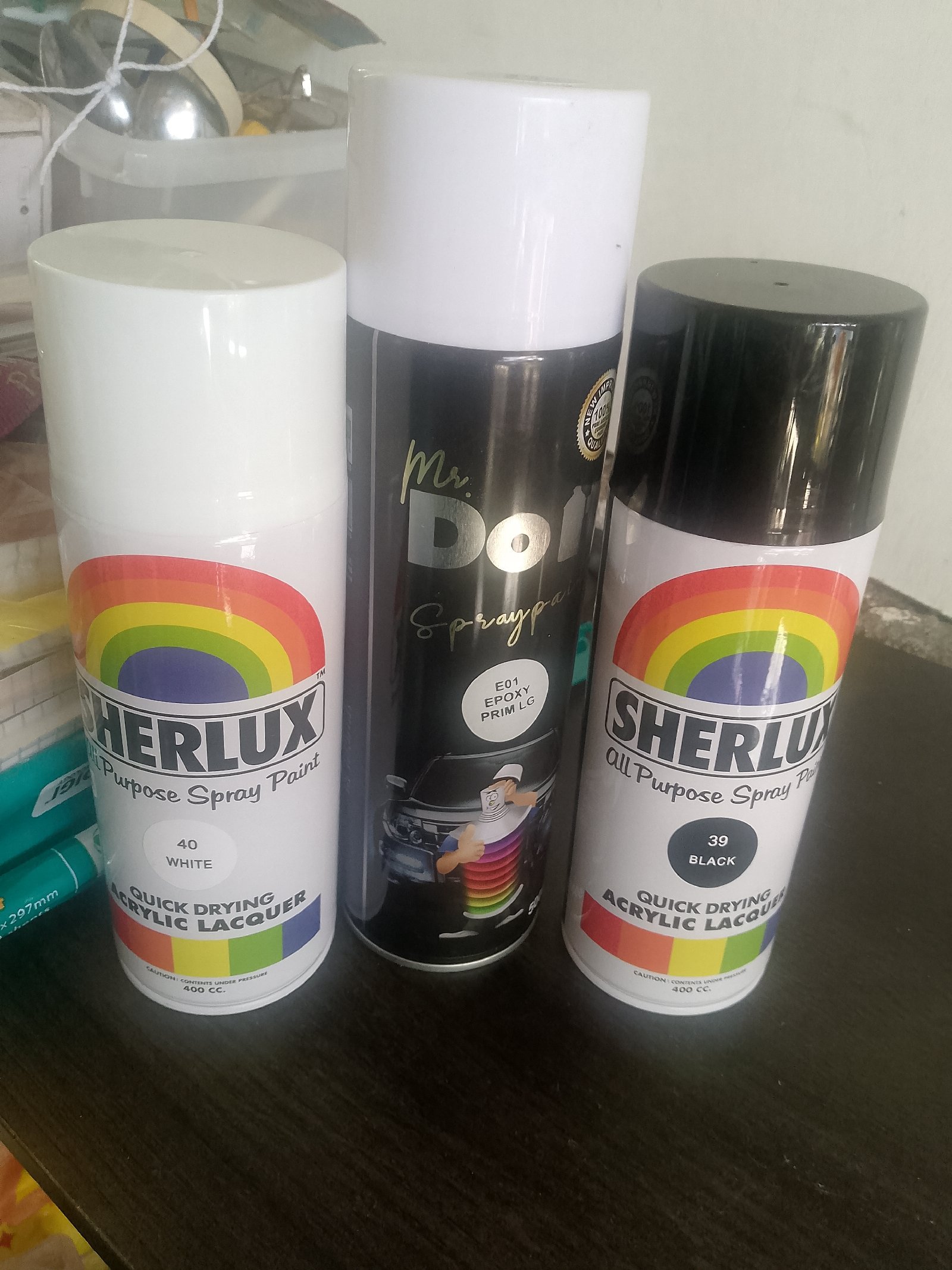 PRIMER AND SPRAY PAINT SHERLUX
